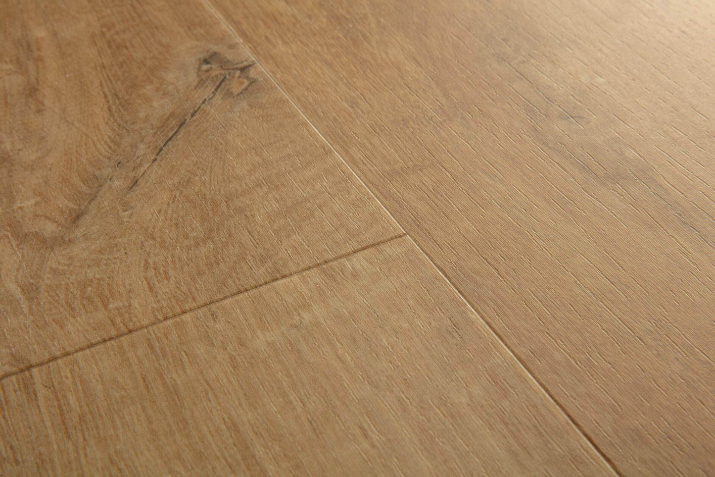 Close-up of wooden flooring with a visible grain pattern