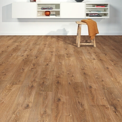 Wooden flooring with a stool and cushions in a room setting