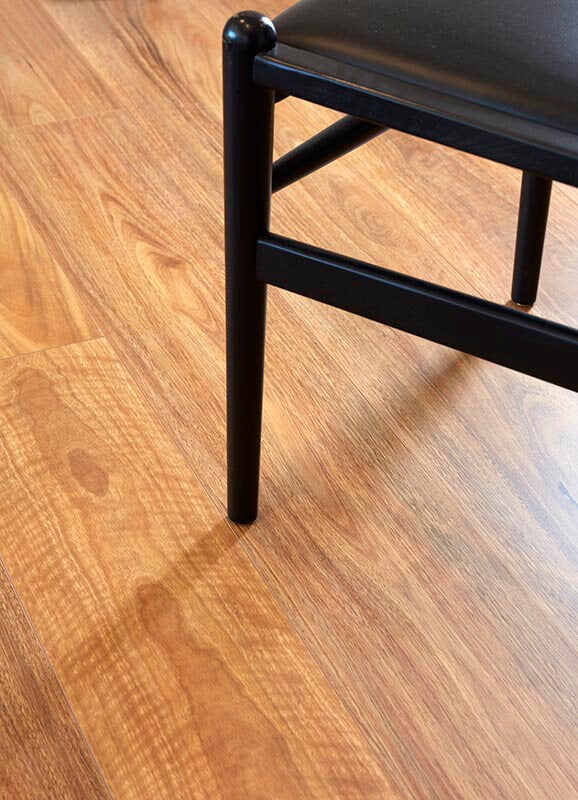 Black chair on a wooden floor