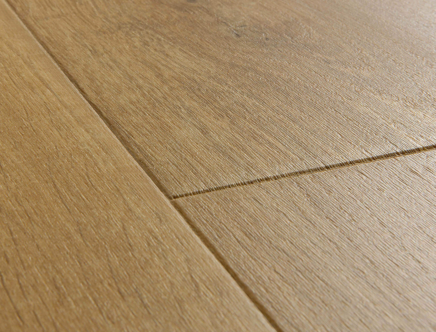 Close-up of wooden flooring with a visible grain pattern