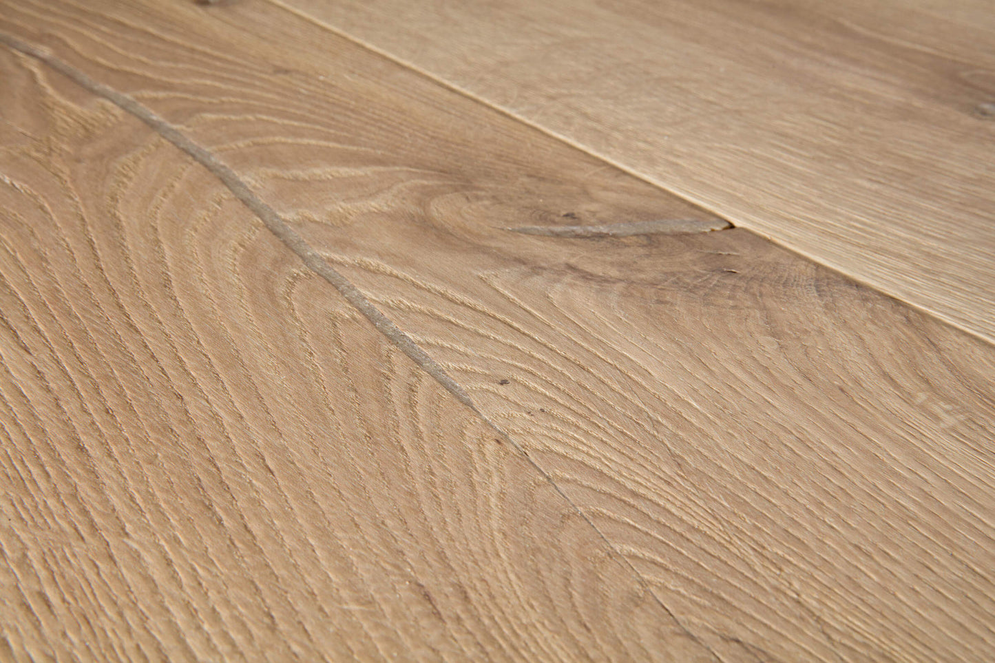 Close-up of wooden flooring with a visible grain pattern