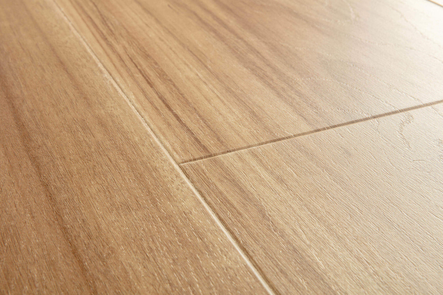 Close-up of a wooden floor with visible grain and texture
