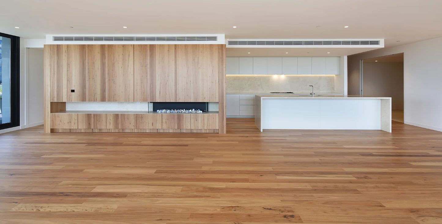Modern kitchen with wooden cabinets and white countertops
