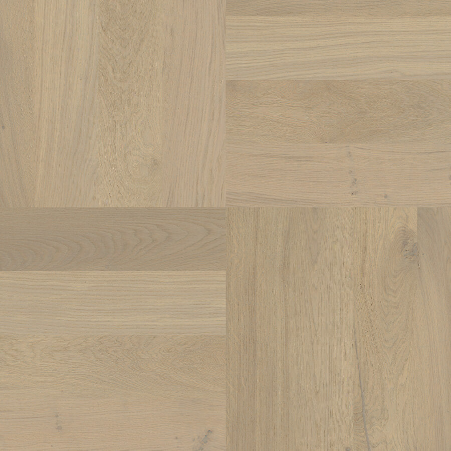 Close-up of wooden flooring with a herringbone pattern