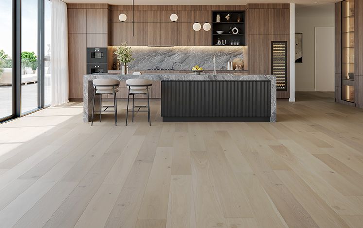 Modern kitchen with wooden flooring and large windows