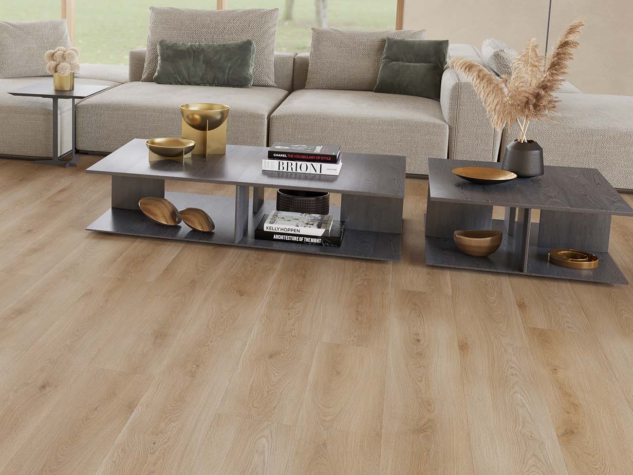 Modern living room with a sectional sofa and coffee table set on a wooden floor.