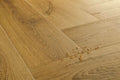 Close-up of wooden flooring with a few small objects on it