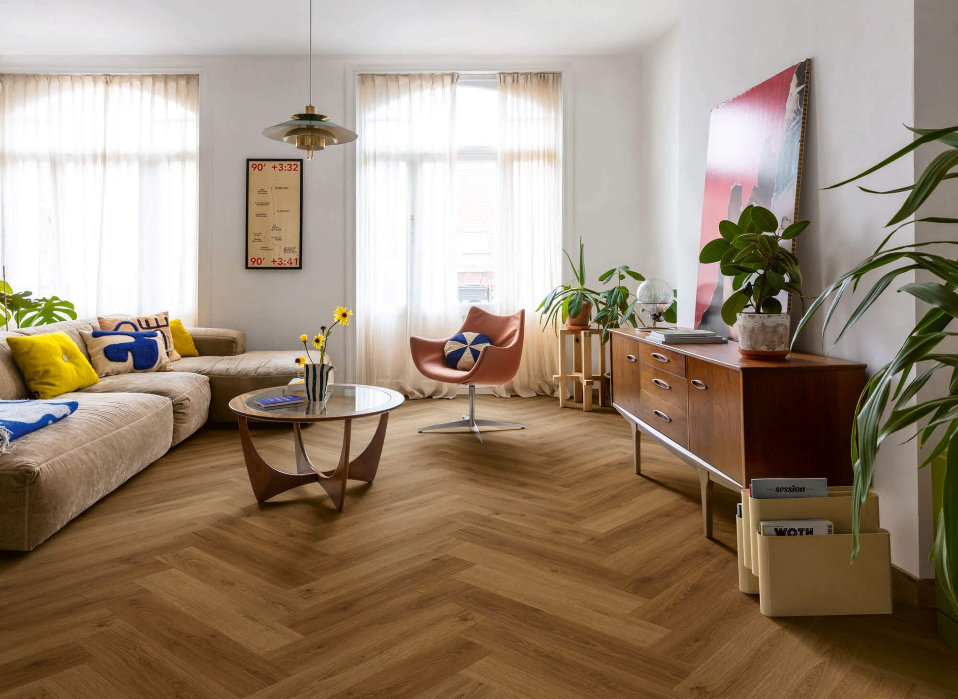 Modern living room with wooden floor, furniture, and decor