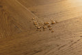 Wooden floor with water droplets on it