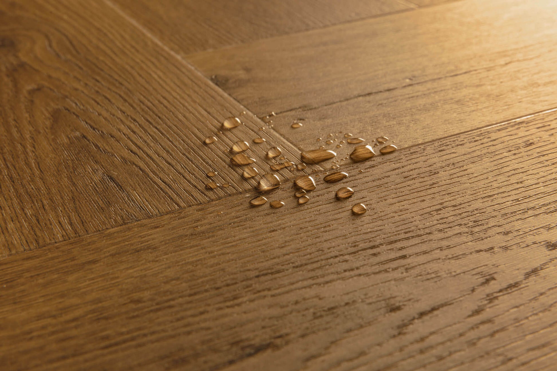 Wooden floor with water droplets on it