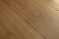 Close-up of a wooden floor with visible grain and texture