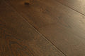 Close-up of a wooden floor with visible grain and texture