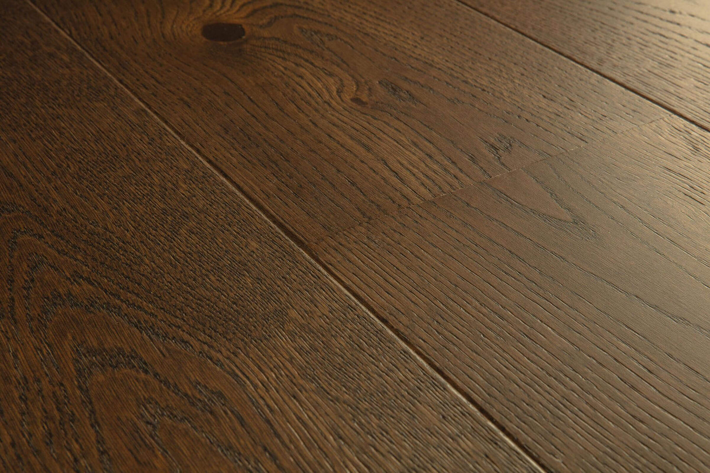 Close-up of a wooden floor with visible grain and texture