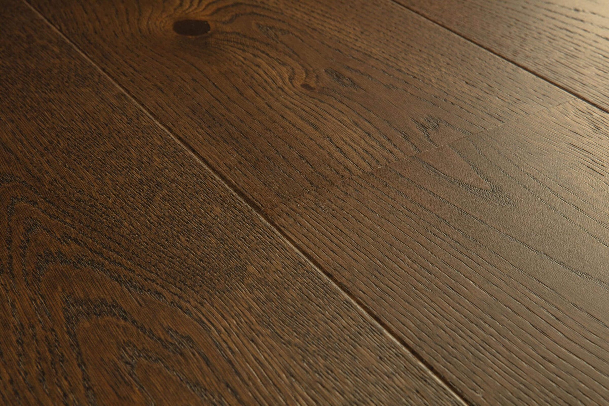Close-up of a wooden floor with visible grain and texture