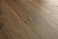 Close-up of a wooden floor with visible grain and texture