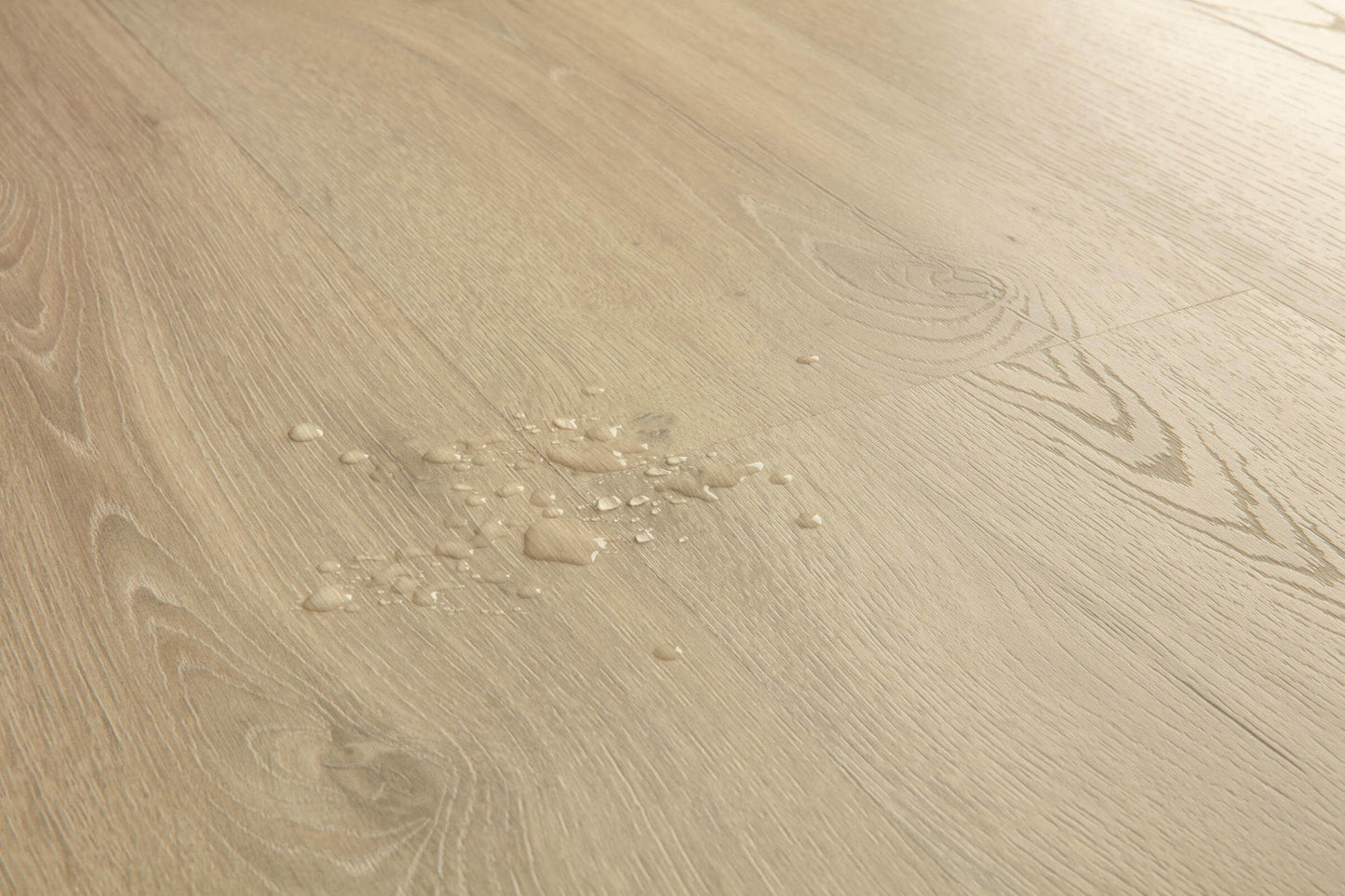 Close-up of a beige wooden surface with visible grain and texture