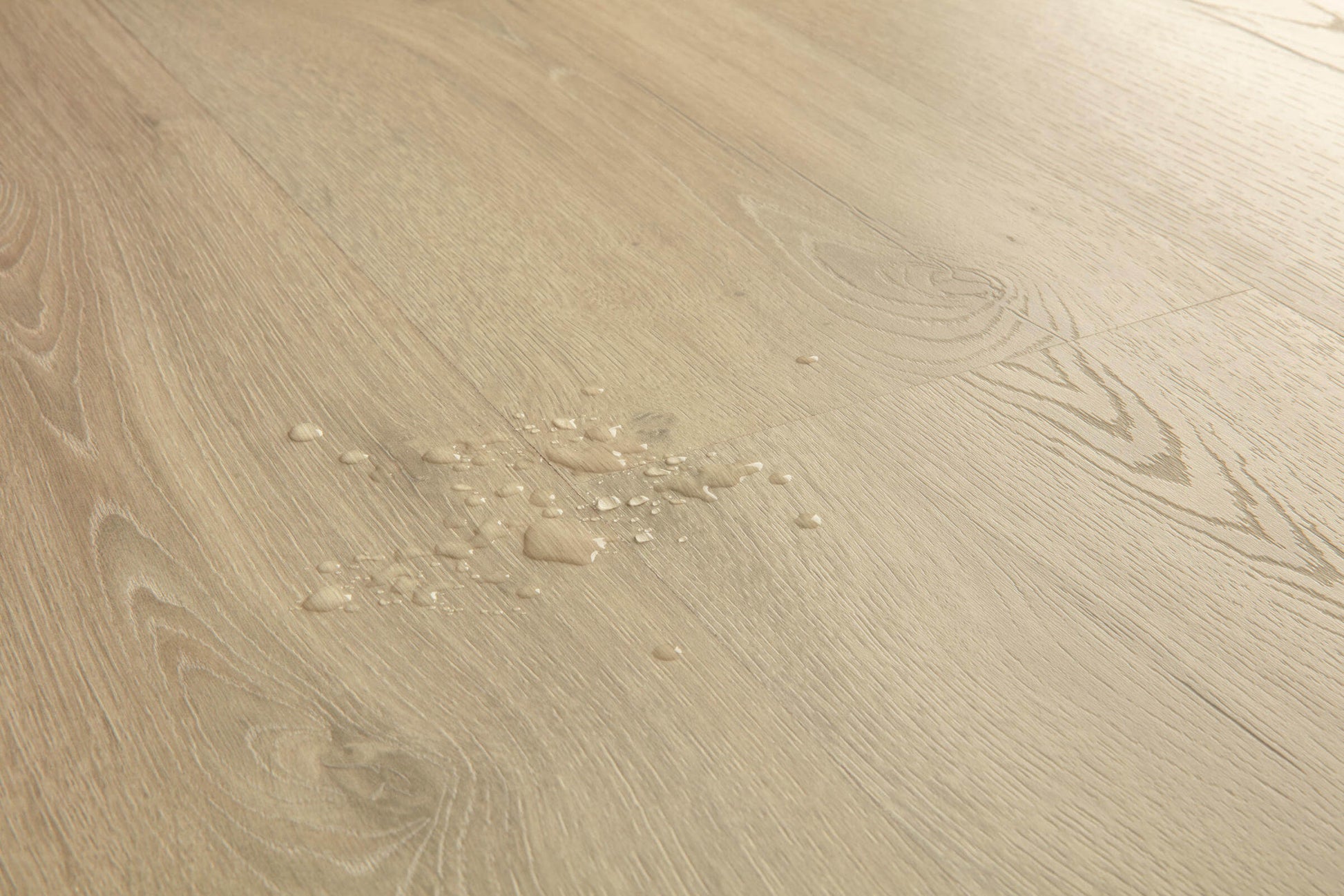 Close-up of a beige wooden surface with visible grain and texture