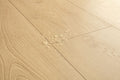 Close-up of a wooden floor with visible grain and texture