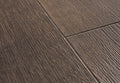 Close-up of dark wood flooring with visible grain and texture