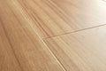 Close-up of a wooden floor with visible grain and texture