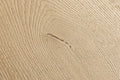 Close-up of a textured beige surface with subtle patterns