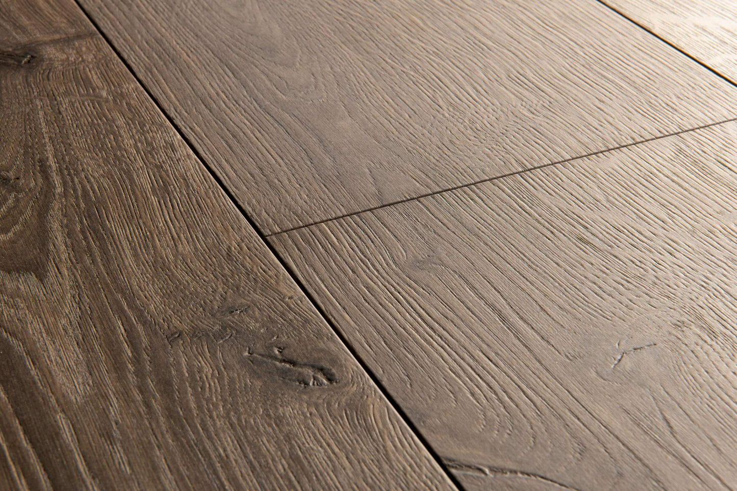 Close-up of a wooden floor with a natural finish