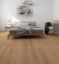 Modern bedroom with wooden floor, bed, and shelves.