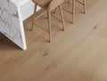 Wooden flooring with a marble countertop in the background