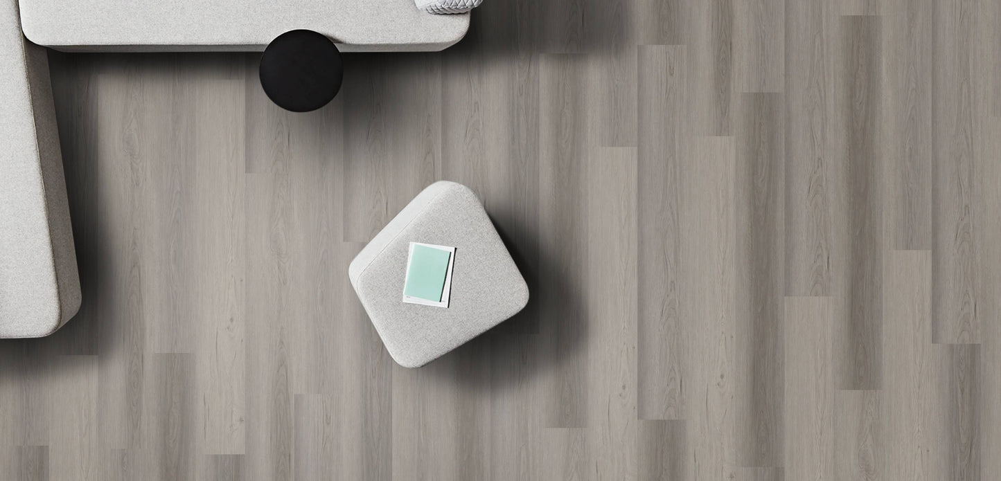 Small white electronic device on a wooden surface
