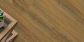 Wooden floor with a plant on a wooden table
